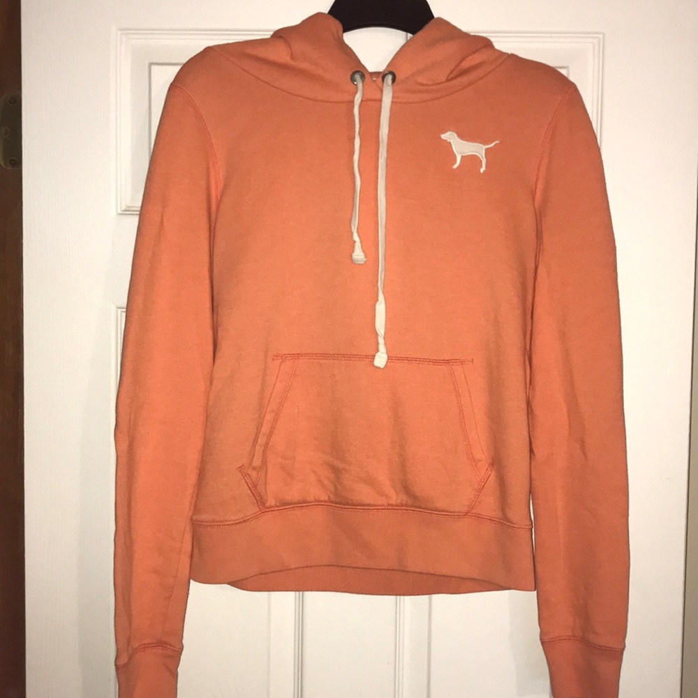 Orange Victoria’s Secret sweatshirt